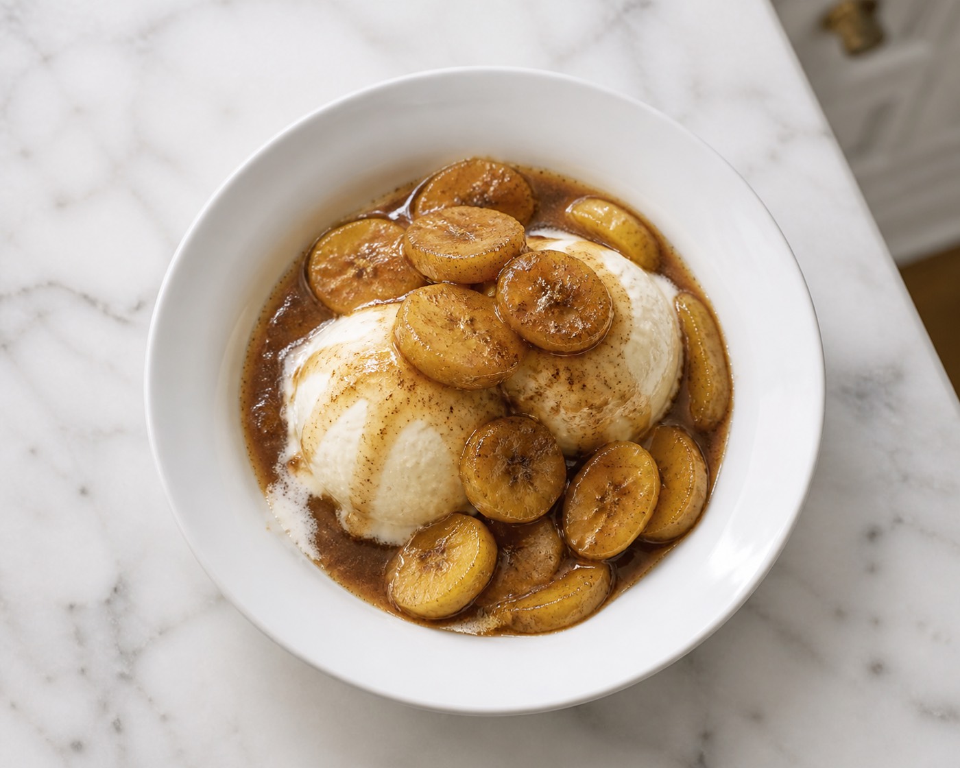 Bananas on Fire, photographed on white marble in the A More Perfect Supper kitchen