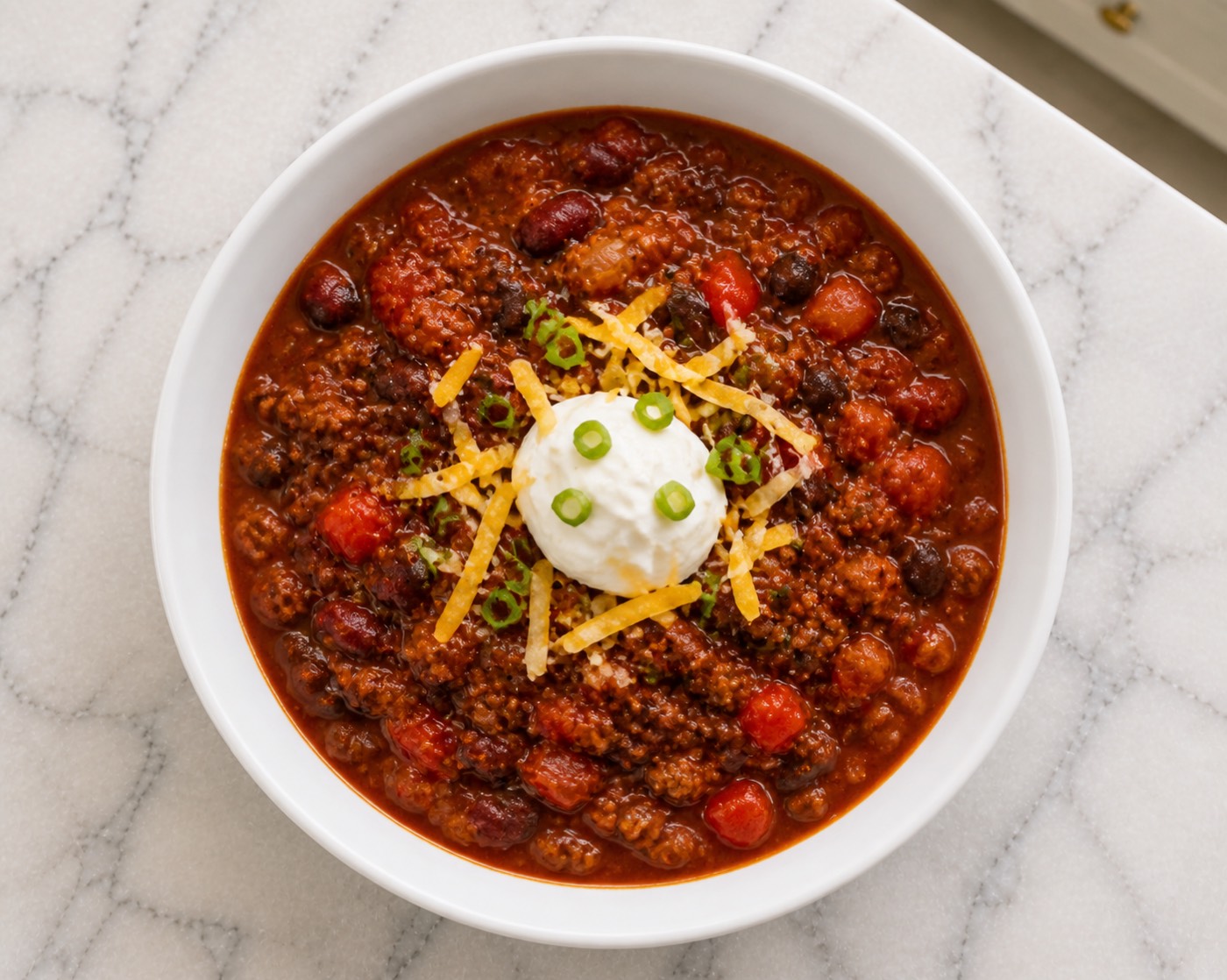 The House Chili, photographed on white marble in the A More Perfect Supper kitchen
