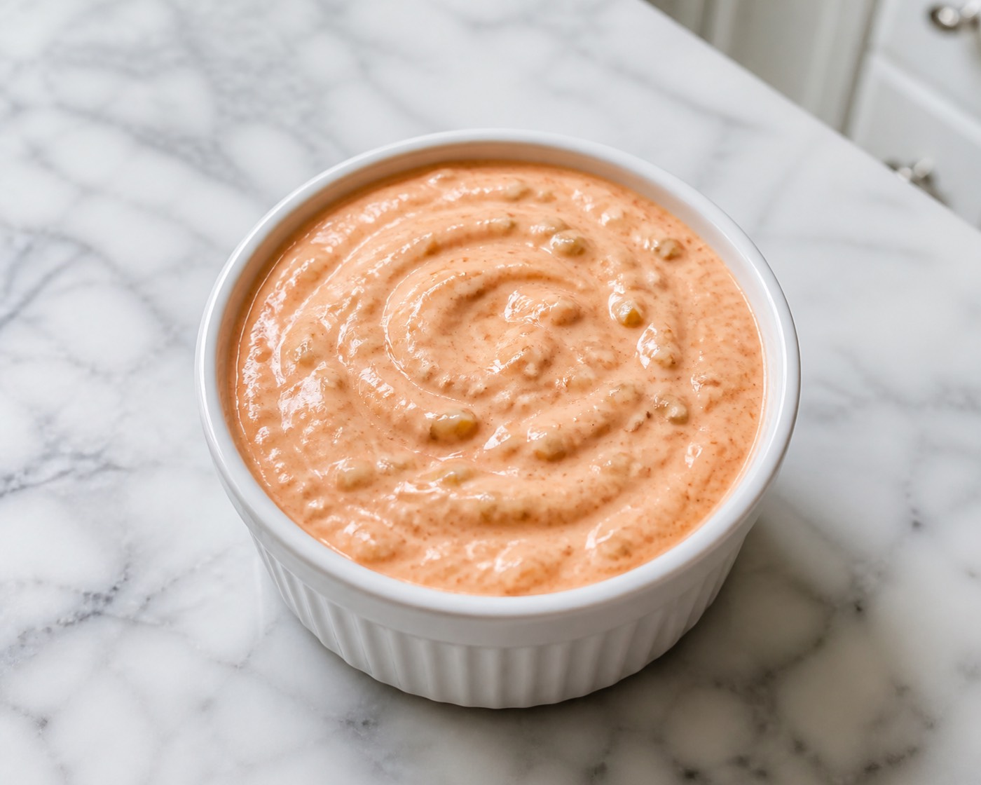 Island Dressing, Mainland Rules, photographed on white marble in the A More Perfect Supper kitchen