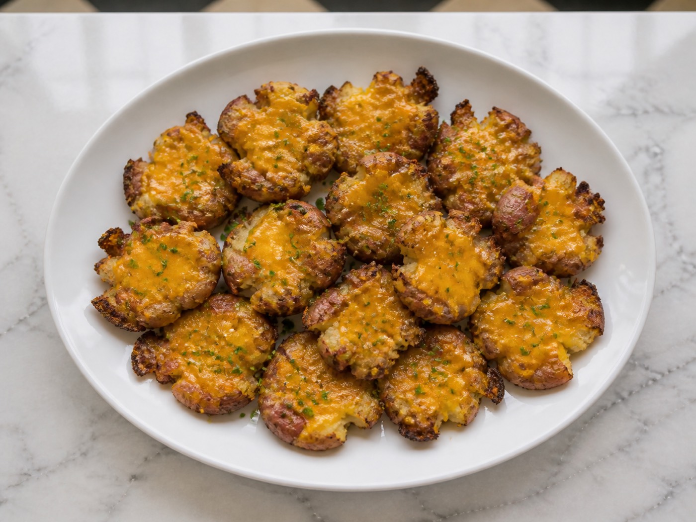 Smashed & Cheddared, photographed on white marble in the A More Perfect Supper kitchen