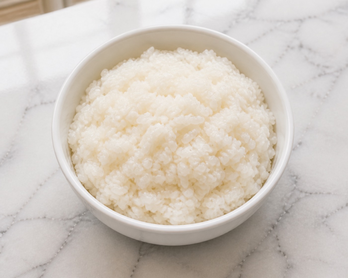 Sushi Rice, Properly, photographed on white marble in the A More Perfect Supper kitchen