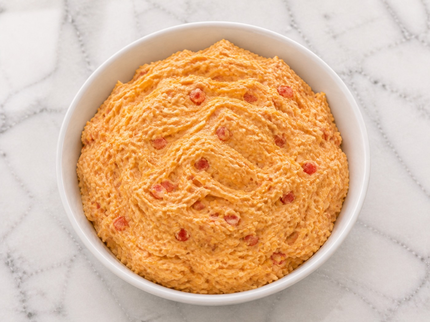 The Pimento Cheese Standard, photographed on white marble in the A More Perfect Supper kitchen